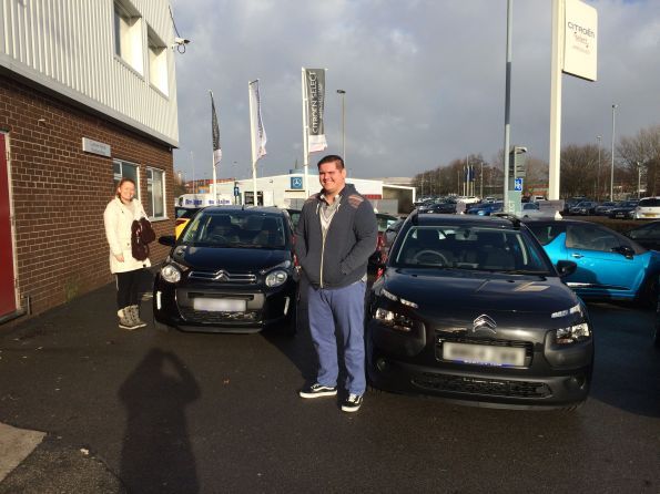 Mr & Mrs McEntee with their brand new ‘his and hers’ cars from Citroen Bolton!