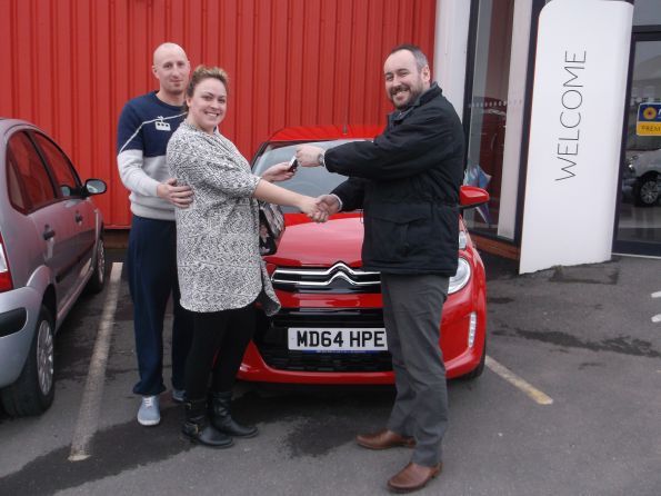 Miss Roscoe collecting her new C1 from Citroen Bury