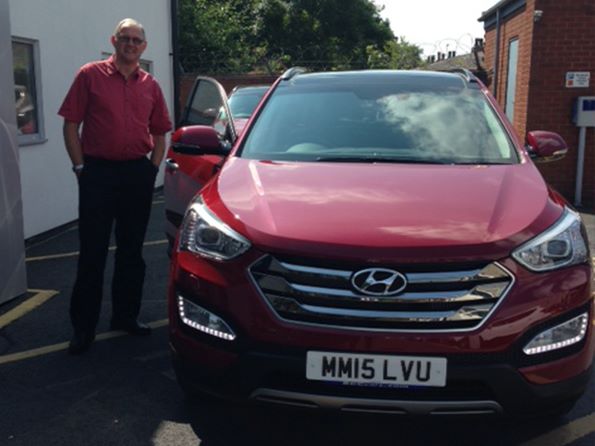 Mr Bearman collecting his 6th car from BCC! We hope you love your brand new Santa Fe Premium SE from Dave Partington.